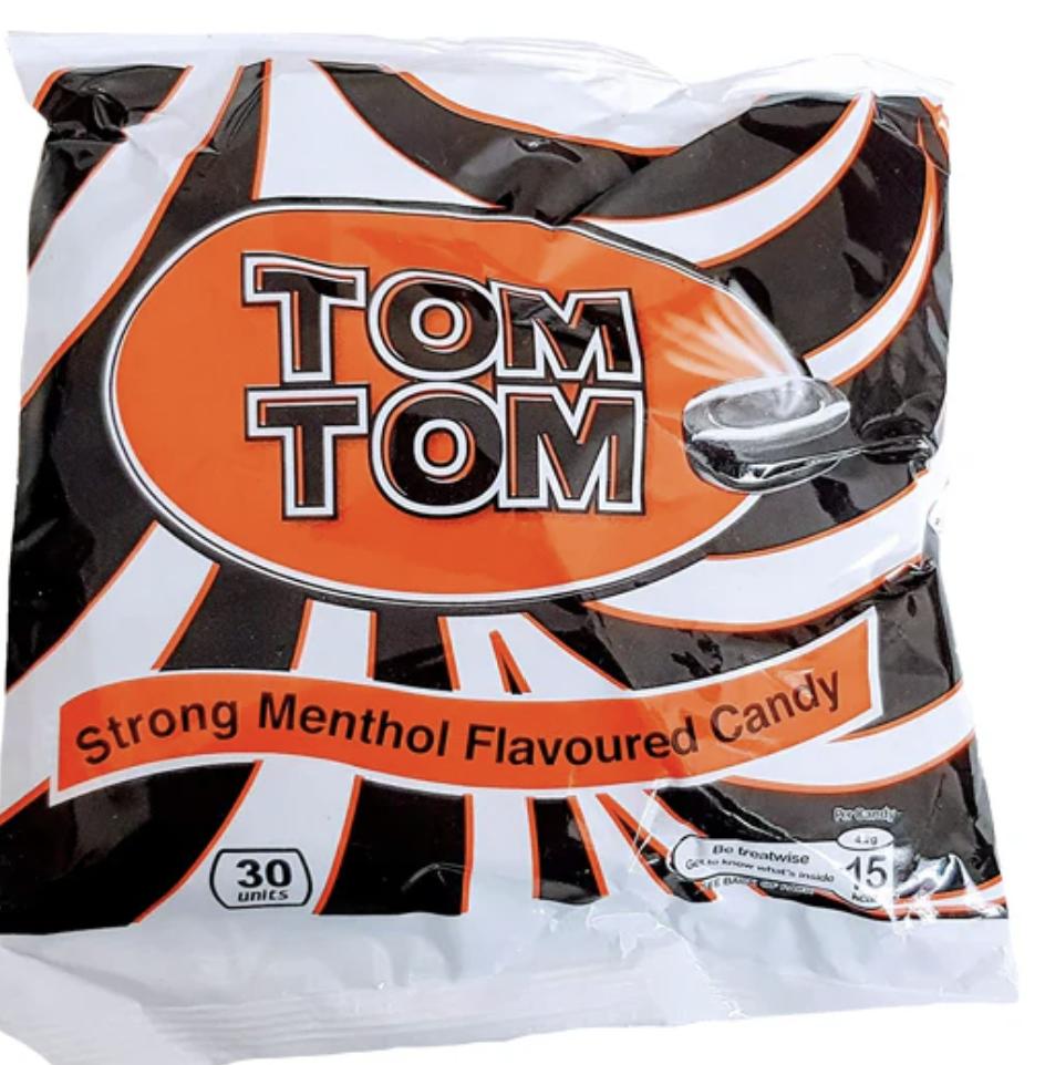 A package of TomTom strong Menthol Flavoured Candy with a white and orange design, indicating the flavor and brand.