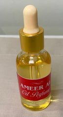 glass of Mini ameer Oud Oil Perfume
