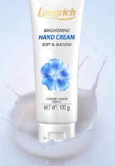 Longrich brightening hand cream tube with blue flower design on a light background
