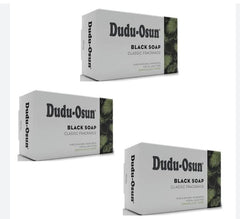 Three boxes of Dudu-Osun Black Soap on a white background
