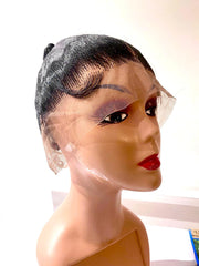 Mannequin head with a black lace wig on a white background