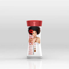 Bottle labeled 'White Secret' with a red cap on a light gray background