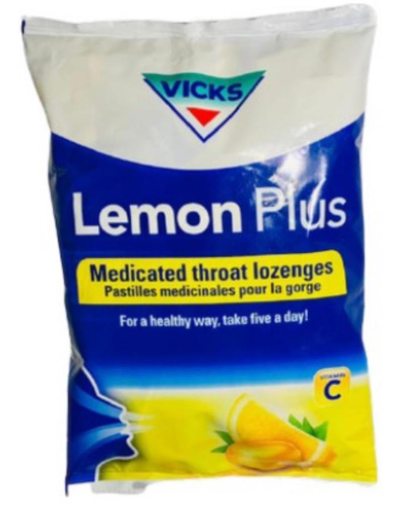 Vicks Lemon Plus medicated throat lozenges packaging on a white background
