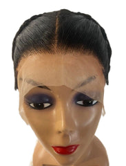Black lace wig on a mannequin head with makeup