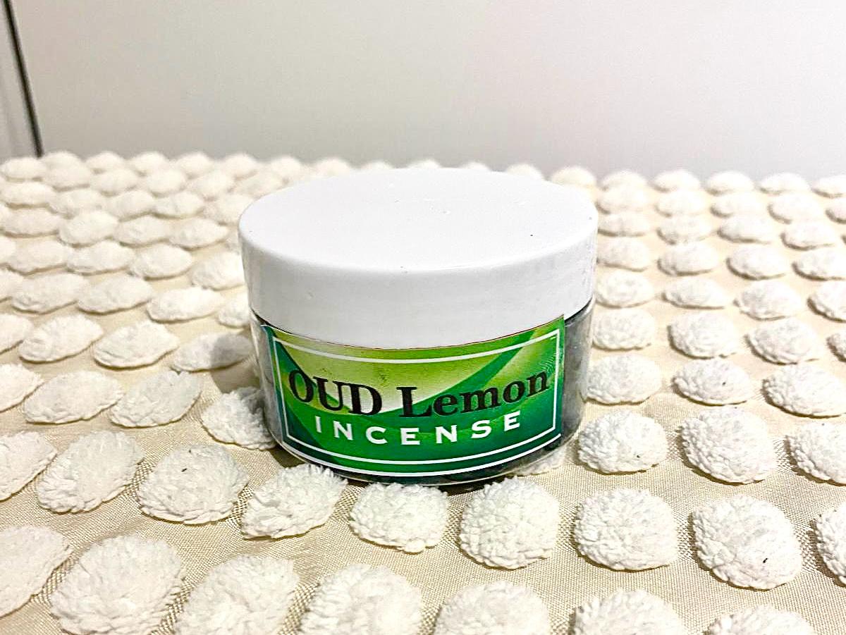 a jar of natural wood incense flakes