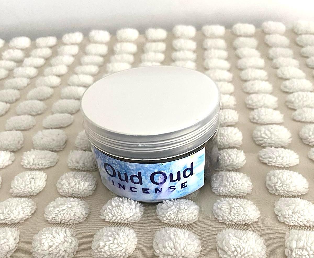 a jar of natural wood incense flakes