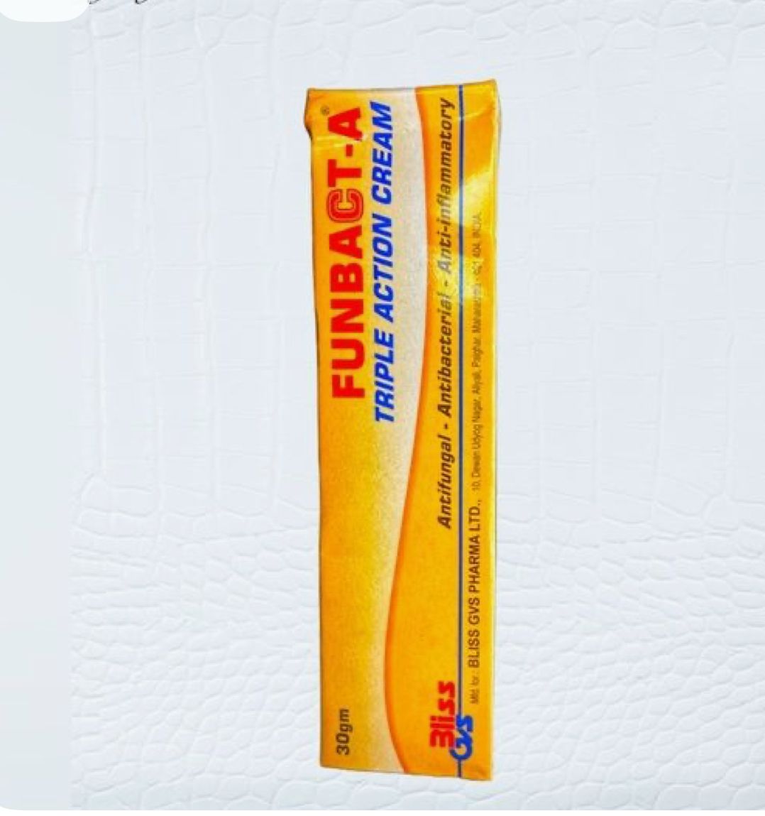 A tube of Funbact-A Tripple Action Cream with yellow packaging.
