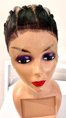 Mannequin head with a wig on a white background